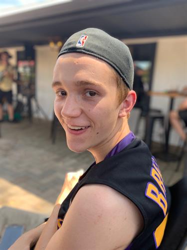 Elijah Arranz  Boy smiling at camera from wheelchair