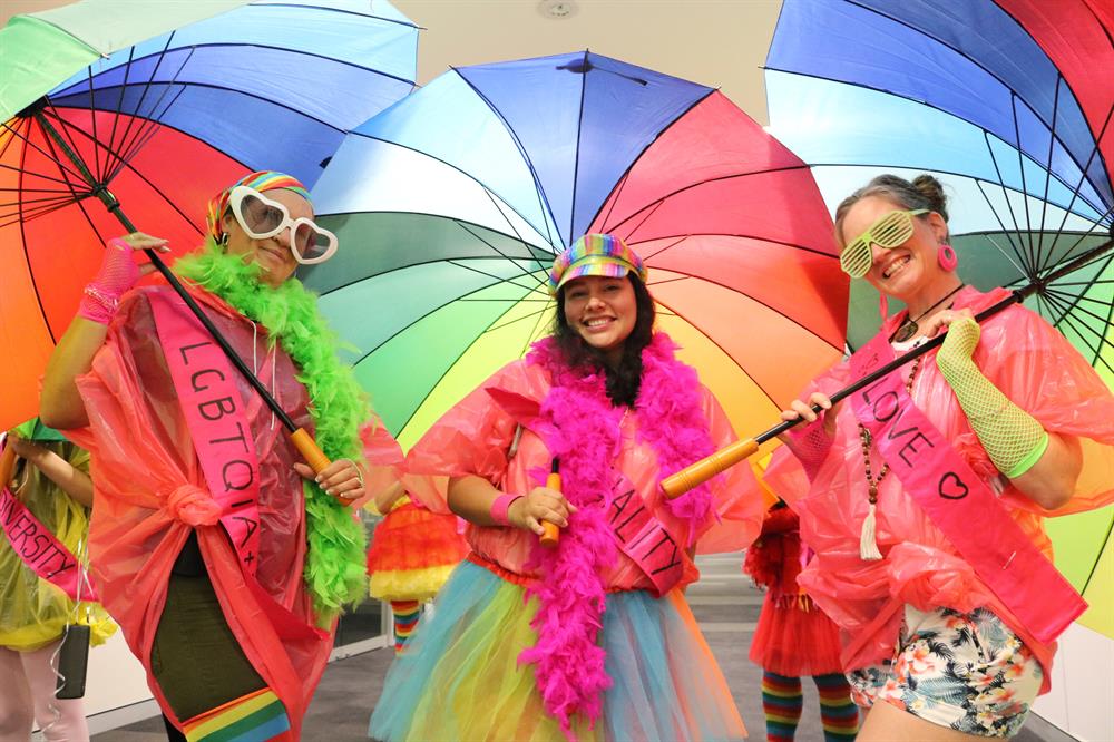 FEB2020 MARDI GRAS 1 Three girls dressed up colourfully for Mardi Gras