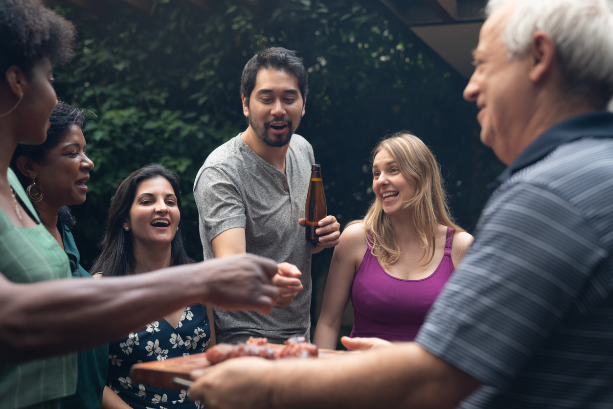 Group of people celebrating with a bbq