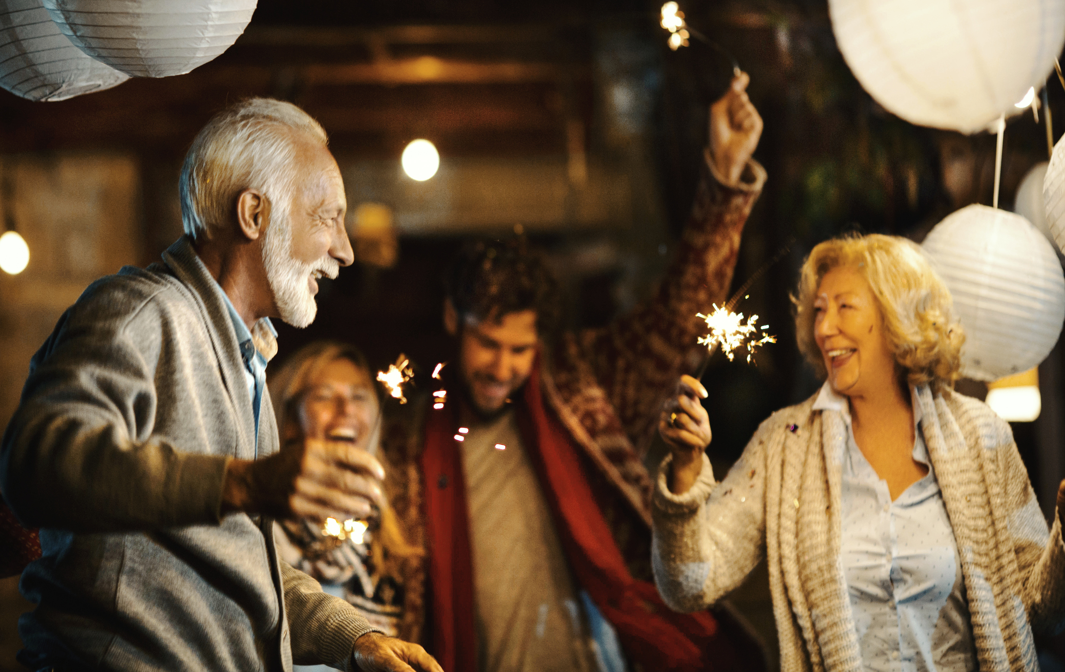 Family with sparkles dancing