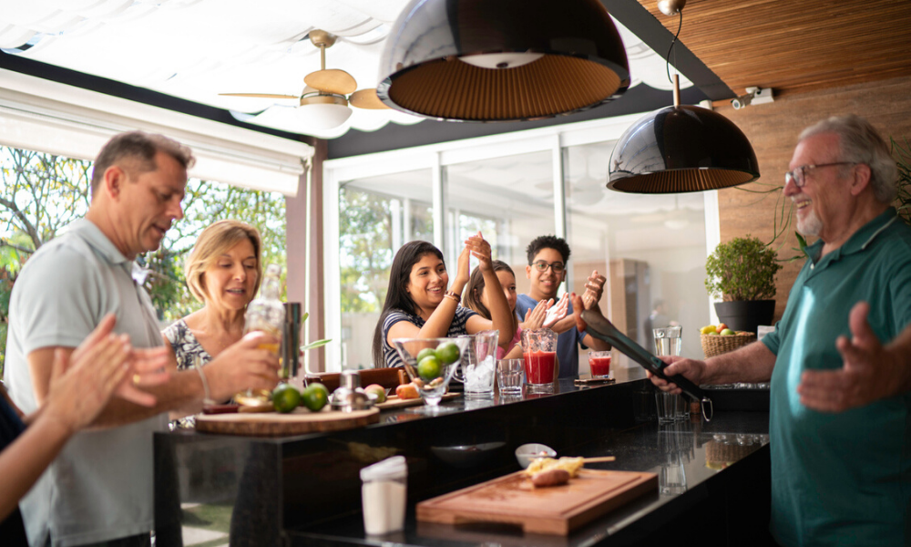 Group of friends gathering around a bbq