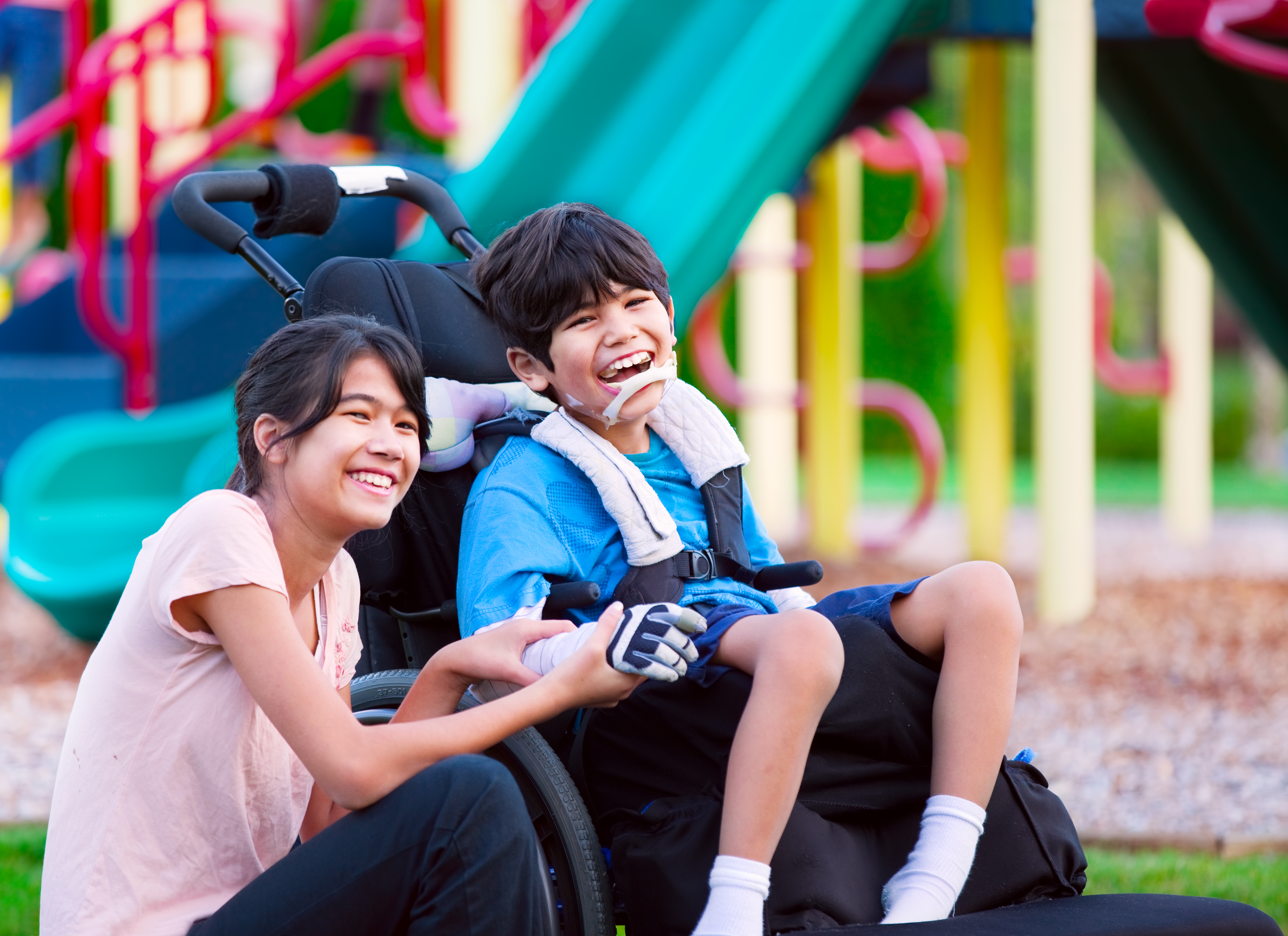 Young Boy - in wheelchair with sister