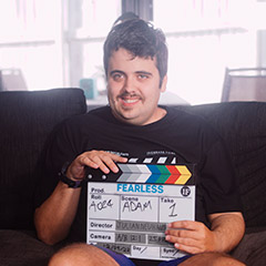 Photo: Adam Broadstock holding Fearless Films clapper board