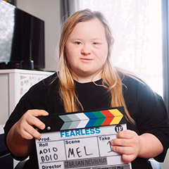 Photo: Melissa Kirkman holding Fearless 4 clapper board